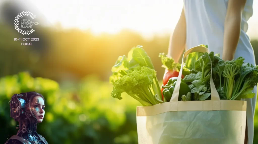 Person holding a reusable grocery bag with fresh produce in a green park setting.